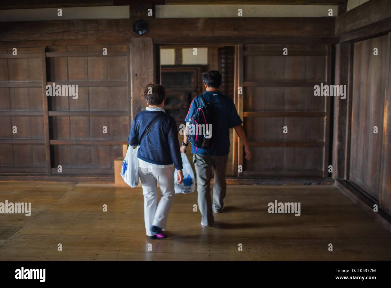 Visitors inside Himeji Castle (Himejijō), also known as White Heron ...
