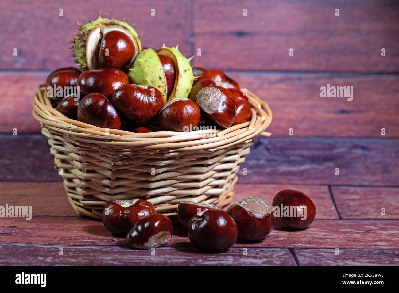 Horse chestnuts in the basket Stock Photo Alamy