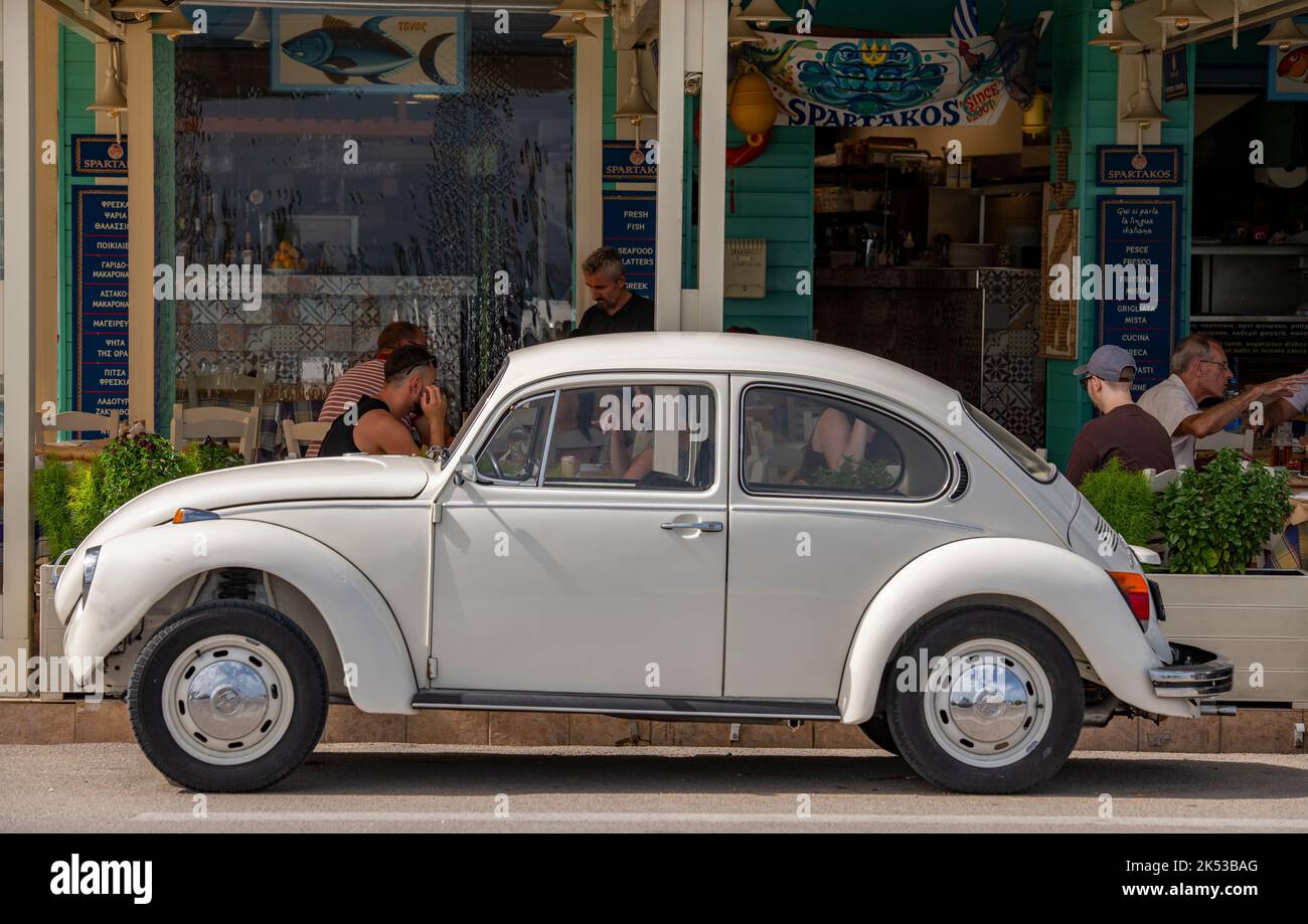 volkswagen beetle, collectors car, vintage volkswagen car, air cooled volkswagen beetle parked outside of a cafe in zante town zakynthos, greece. Stock Photo