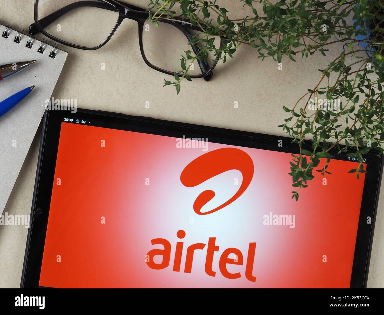 In this photo illustration, Bharti Airtel Limited logo seen displayed on a tablet. Stock Photo