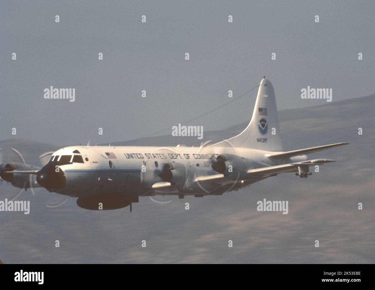 Lockheed P3 Orion operated by United States Department of Commerce makes a fast pass down the runway Stock Photo