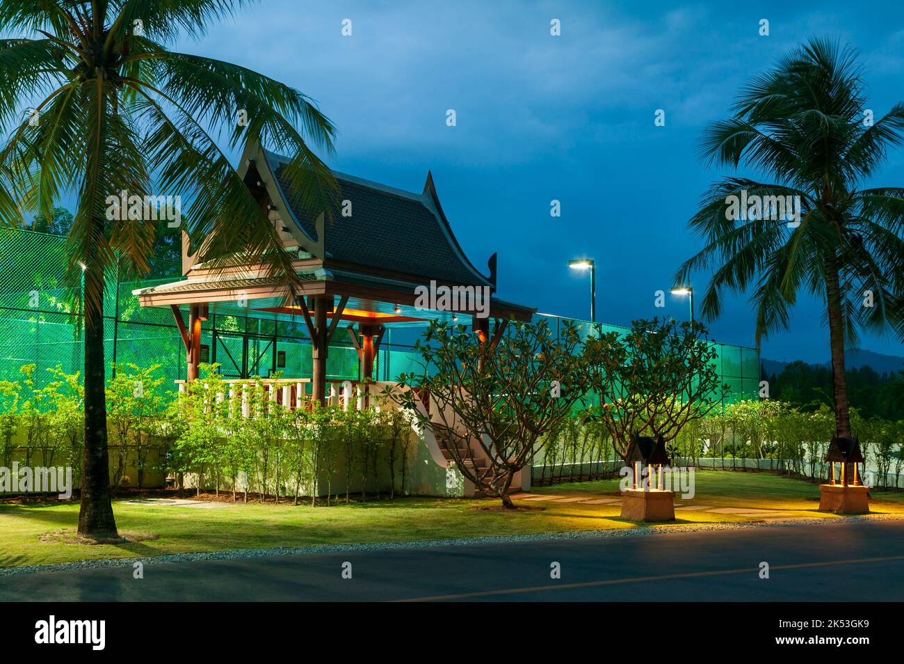 Tennis court and Thai sala architecture at a hotel marina in Phuket