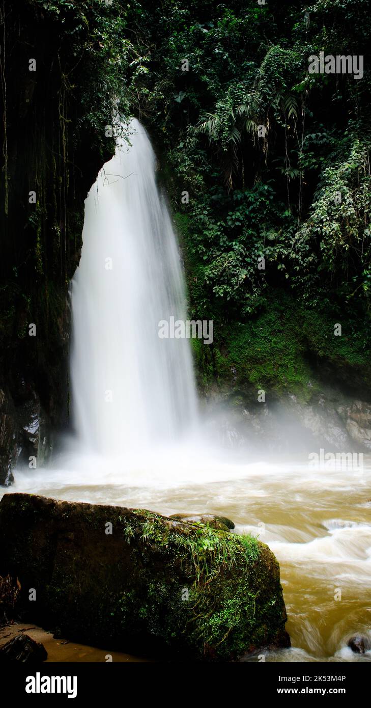 A vertical shot of a scenic landscape of a long exposure waterfall ...