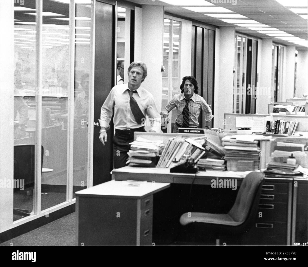 ROBERT REDFORD as Bob Woodward and DUSTIN HOFFMAN as Carl Bernstein in
