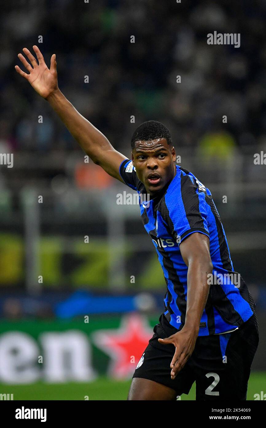 Denzel Dumfries of Fc Internazionale reacts during the Champions League Group C football match between FC Internazionale and FCB Barcelona at San Siro Stock Photo