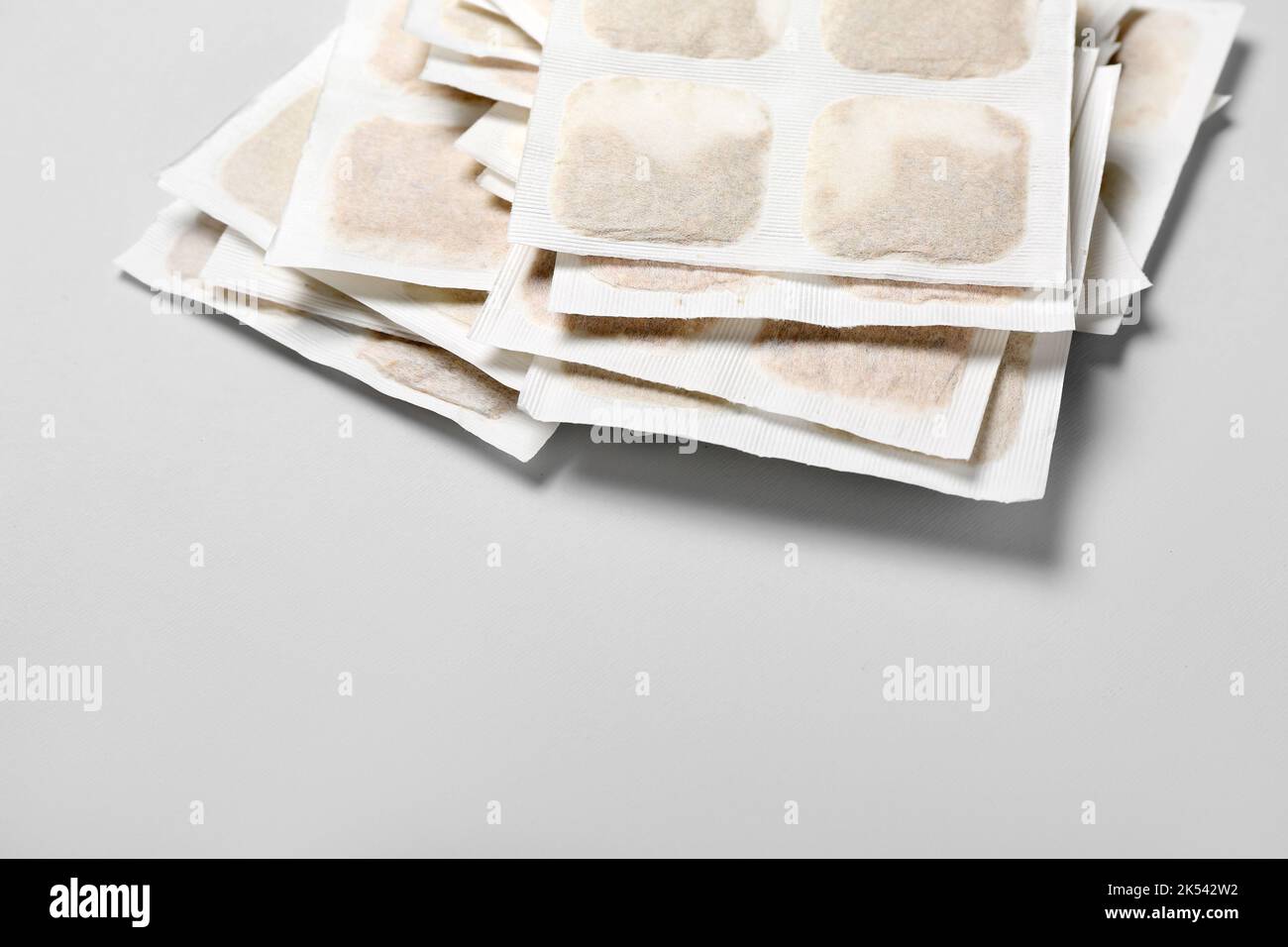 Mustard plasters on grey background Stock Photo Alamy