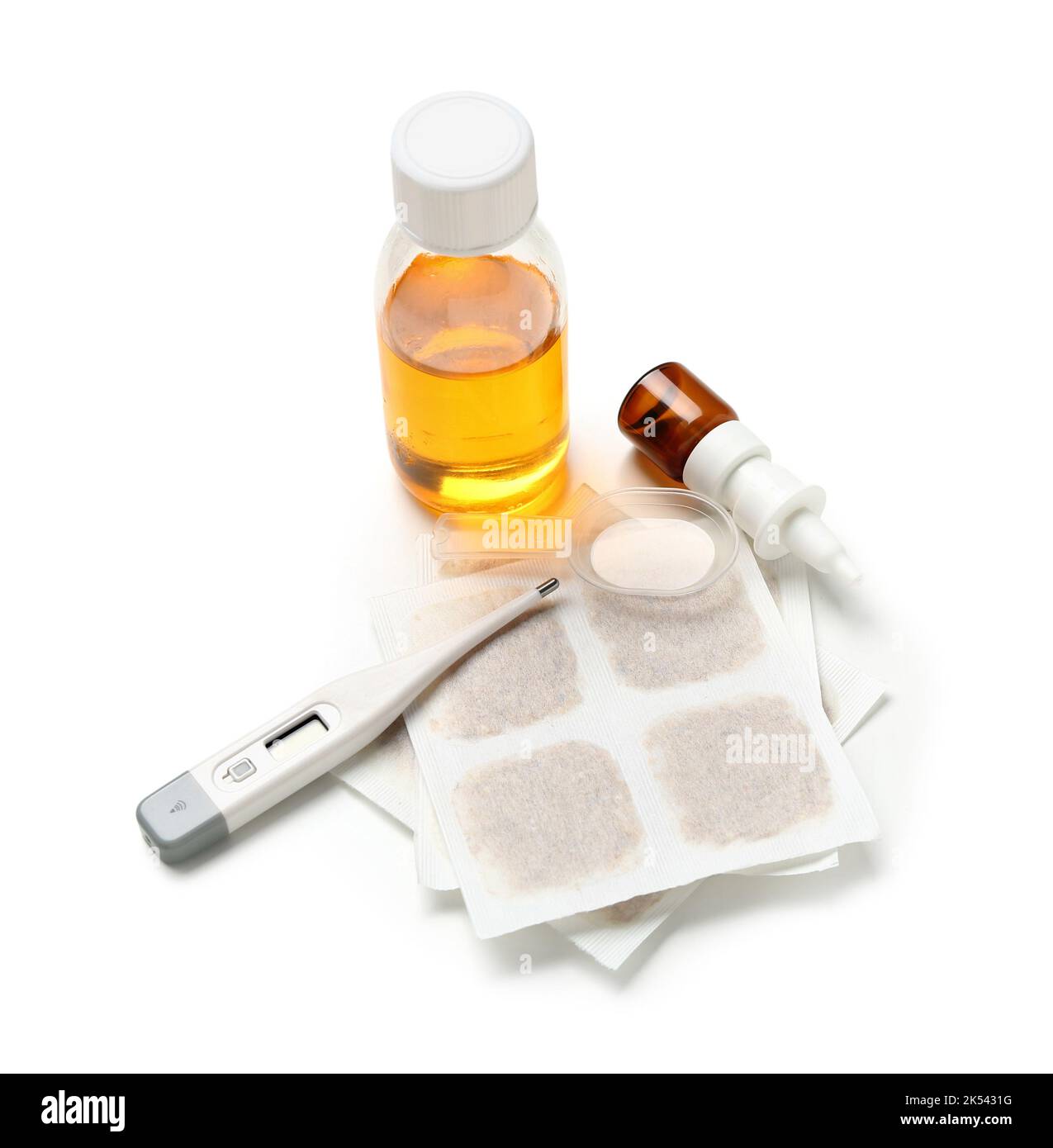 Mustard plasters with cough syrup, nasal drops, spoon and thermometer