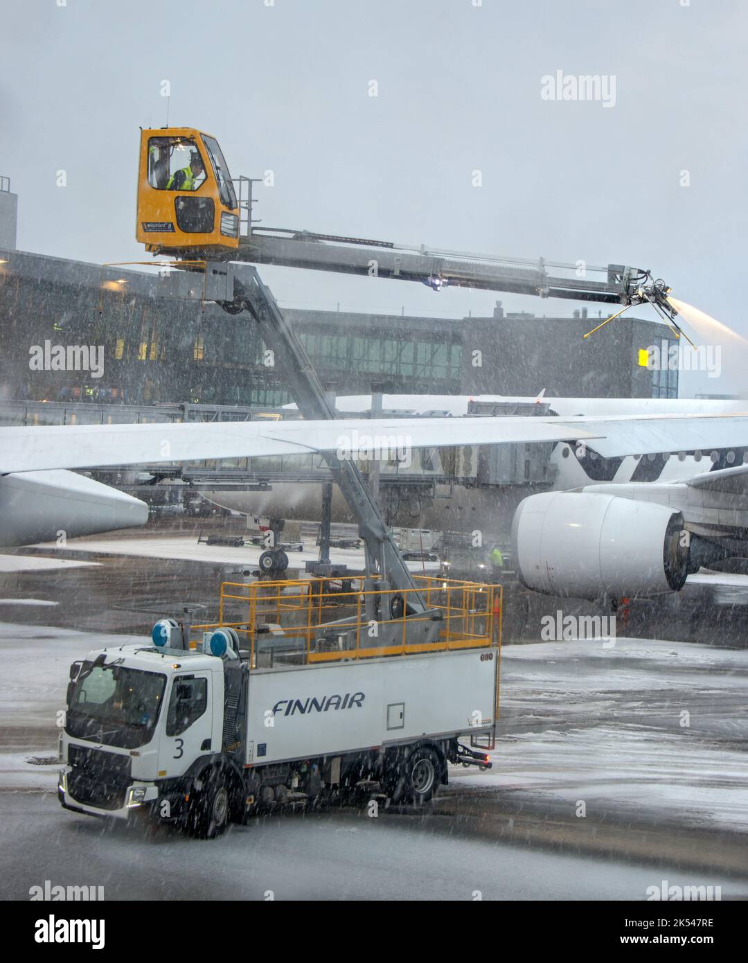 HELSINKI, FINLAND, FEB 15 2022, A aircraft deicing (antiicing) using