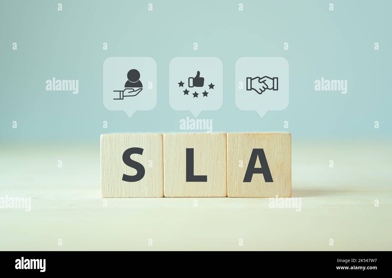 SLA - Service Level Agreement acronym, business concept. Service  performance tracking to reduce the uncertainty the customer in process.  Wooden cubes Stock Photo - Alamy