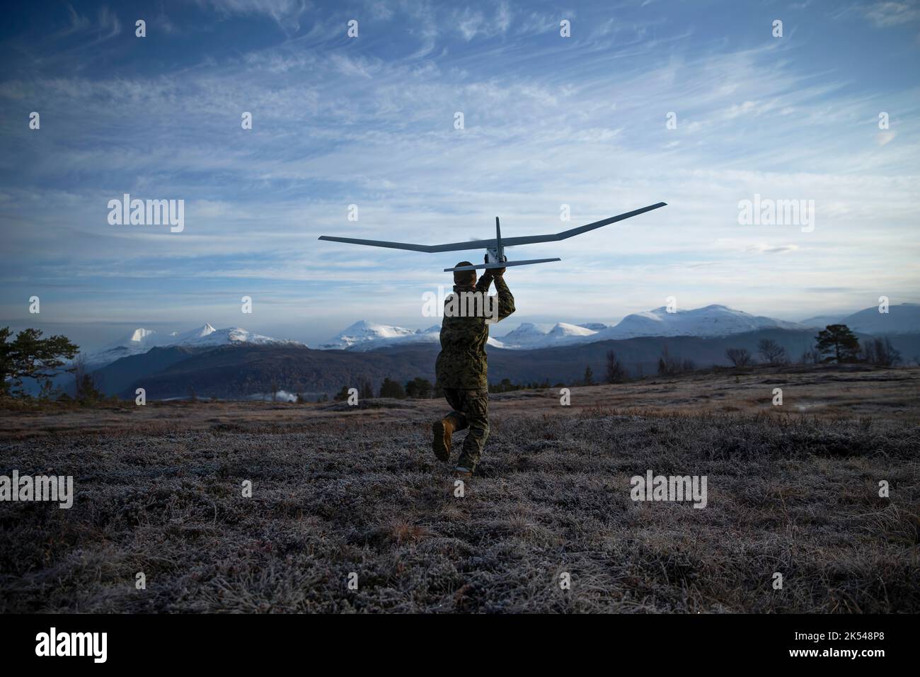 A U.S. Marine with Marine Rotational Force-Europe 20.1, Marine Forces Europe and Africa, launches a small unmanned aerial system in Setermoen, Norway, Oct. 10, 2019. MRF-E focuses on regional engagements throughout Europe by conducting various exercises, arctic cold-weather and mountain-warfare training, and military-to-military engagements, which enhance overall interoperability of the U.S. Marine Corps with allies and partners. (U.S. Marine Corps photo by Sergeant Justin X. Toledo) Stock Photo