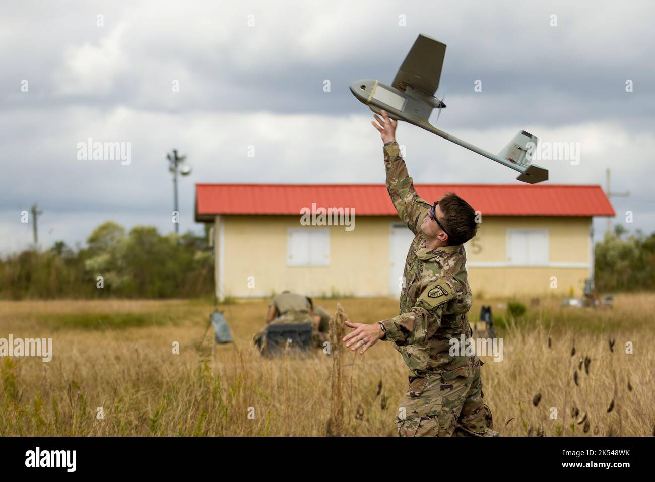 Verified Staff Sgt. Warren Mohan, 1st Battalion, 5th Security Force Assistance Brigade launches a Raven during training alongside 1-2 Stryker Brigade Combat Team, Nov. 10, 2020 at Joint Readiness Training Center 21-2 at Fort Polk, Louisiana. JRTC Rotation 21-2 is a unique training environment where the 1-2 SBCT simulates a partner force brigade with 5th SFAB advising, supporting, liaising, and assessing alongside them to successfully deter and, if necessary, defend against invasion from a hostile force. (Photo by Staff Sgt. Francisco Colon, 1-2 SBCT Public Affairs) Stock Photo