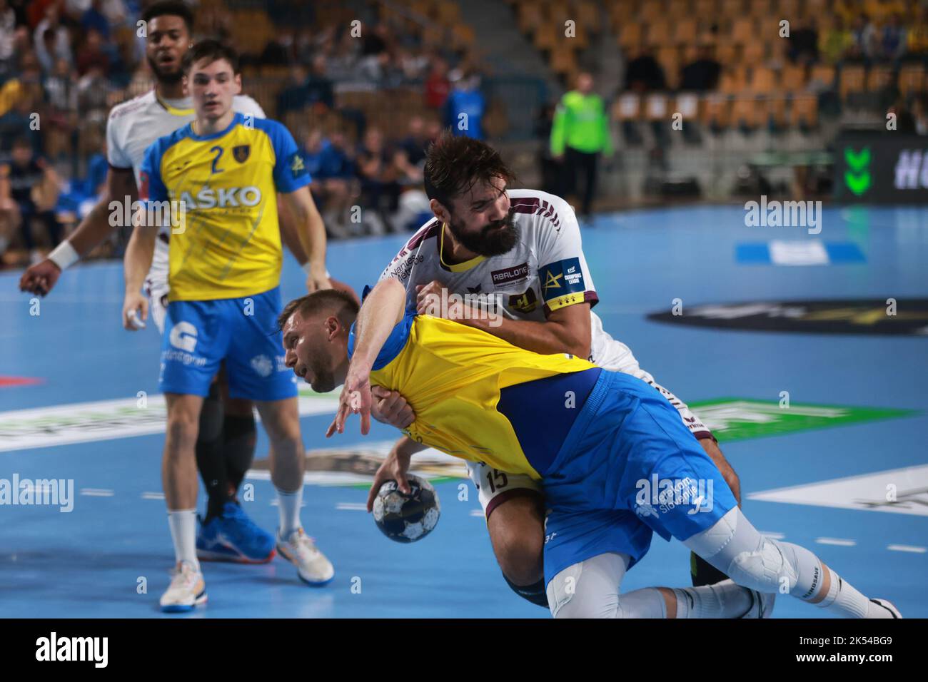 Celje, Slovenia. 5th Oct, 2022. Gal Marguc (front L) of RK Celje vies with Jorg Maqueda Peno (front R) of HBC Nantes during the 4th round of EHF Champions League MEN 2022/23 in Celje, Slovenia, Oct. 5, 2022. Credit: Zeljko Stevanic/Xinhua/Alamy Live News Stock Photo