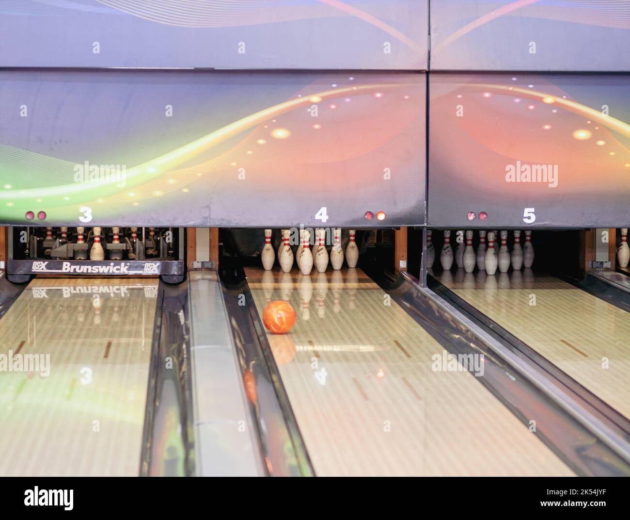 Paths with balls and pins for bowling. A fun game for the company Stock