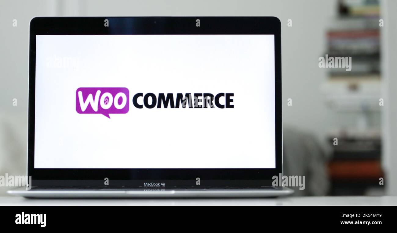 A logo design of woocommerce on a laptop screen in blurred background Stock  Photo - Alamy