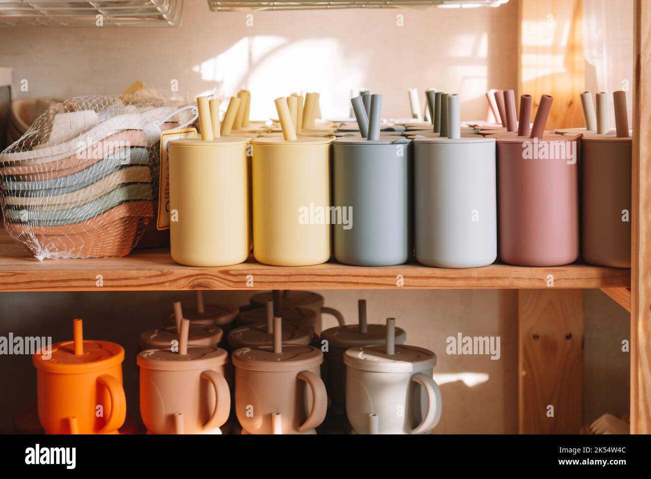 Multicolored silicone baby tableware stack with handles and forms on