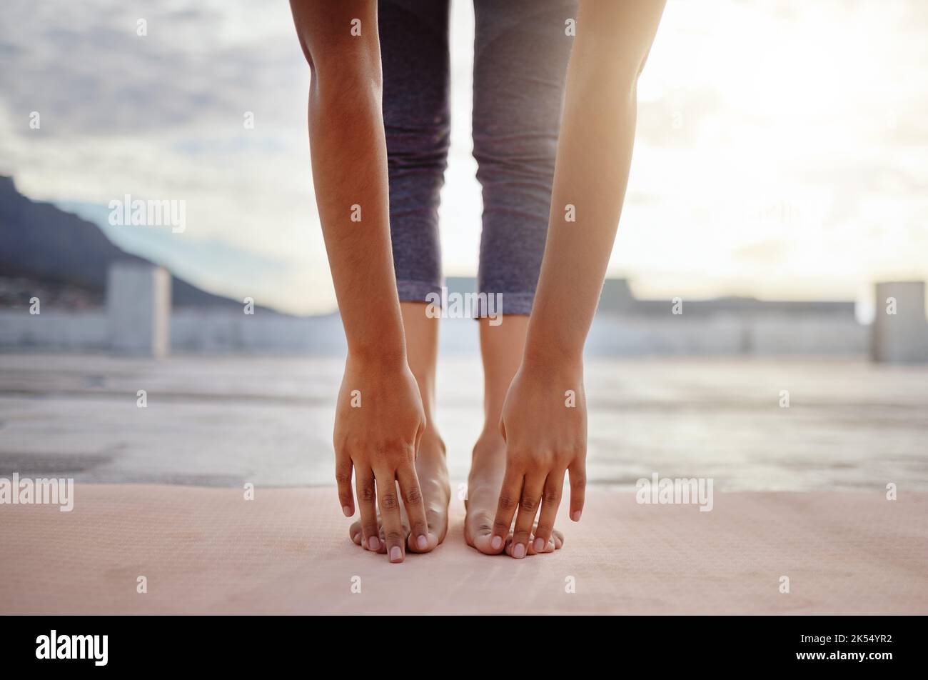 Stretching, feet and legs of woman in yoga meditation or outdoor