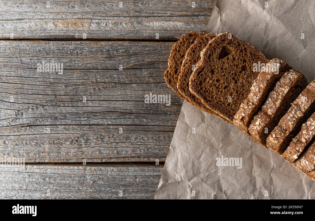 Rye bread on a wooden background. Stock Photo
