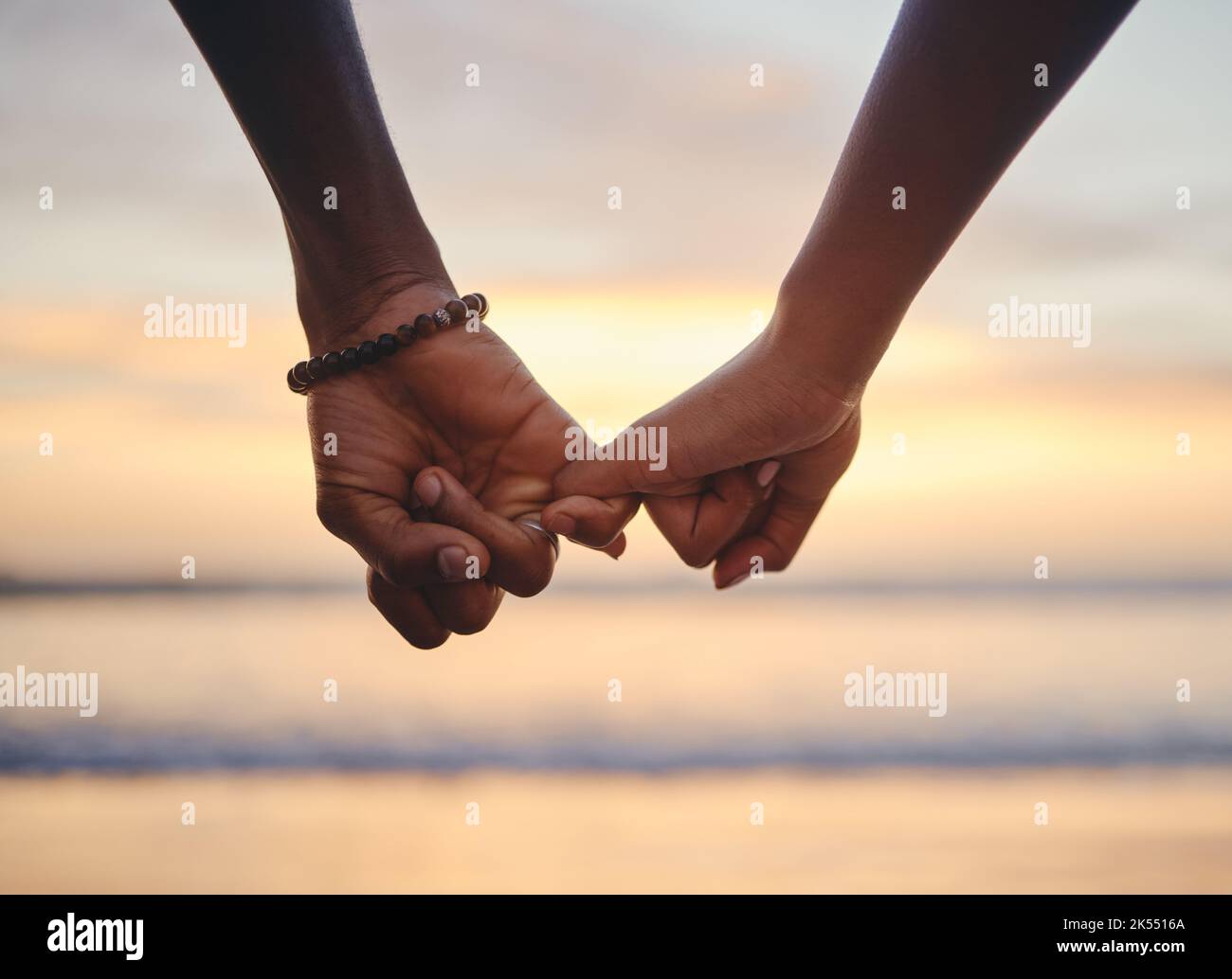 Love, trust and holding hands with couple at beach on Cancun vacation at sunset for happy, goals