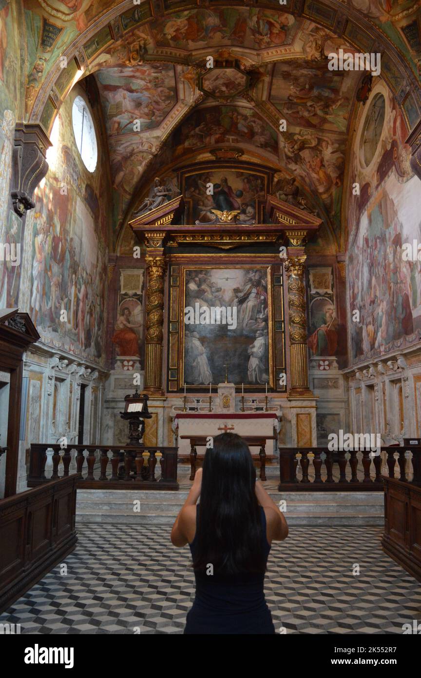 Tuscany, girl in chapel, Certosa di Pontignano, Siena Stock Photo