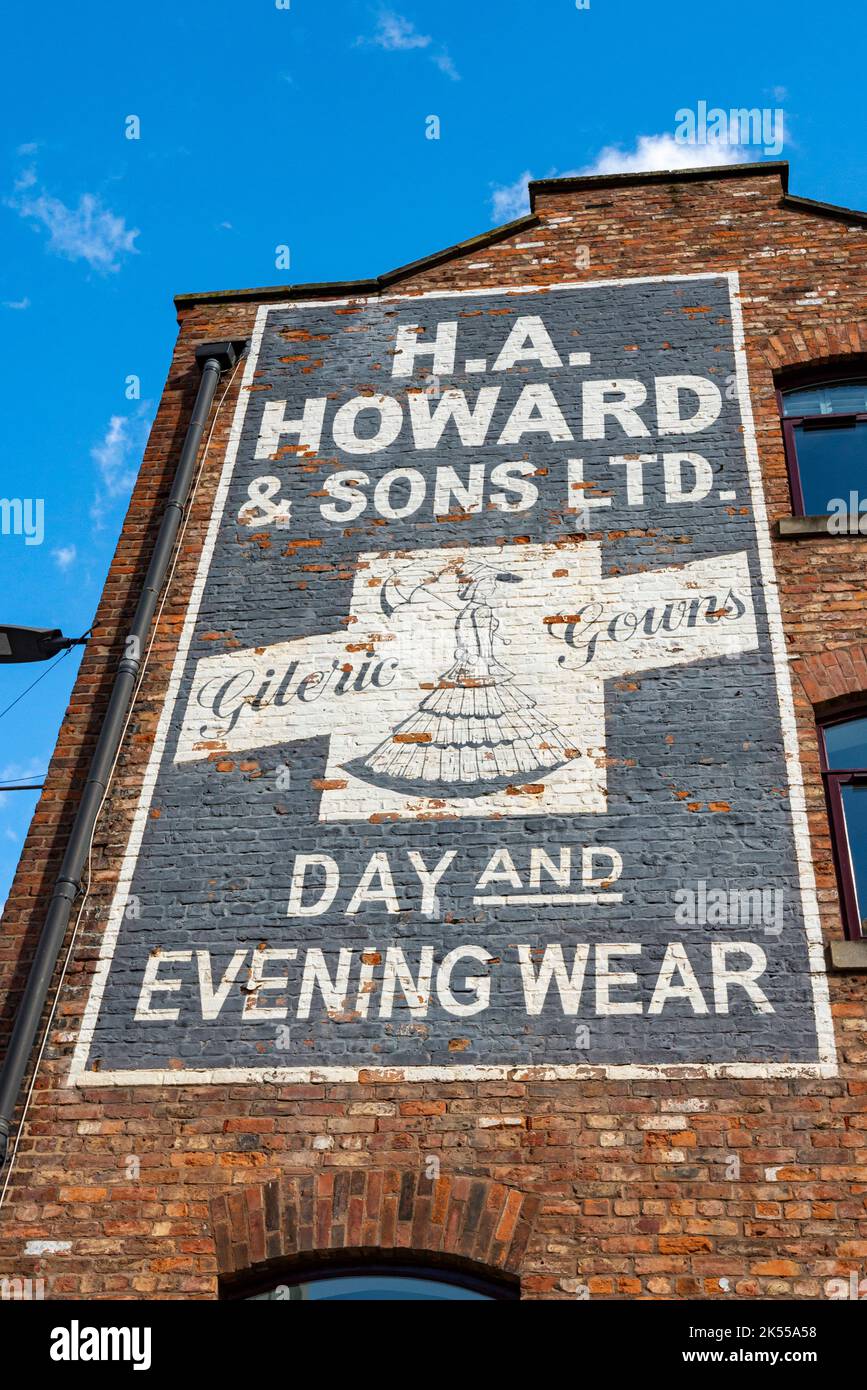 Historic 'ghost' advertising sign on the side of a former lead works in Manchester, England. Stock Photo