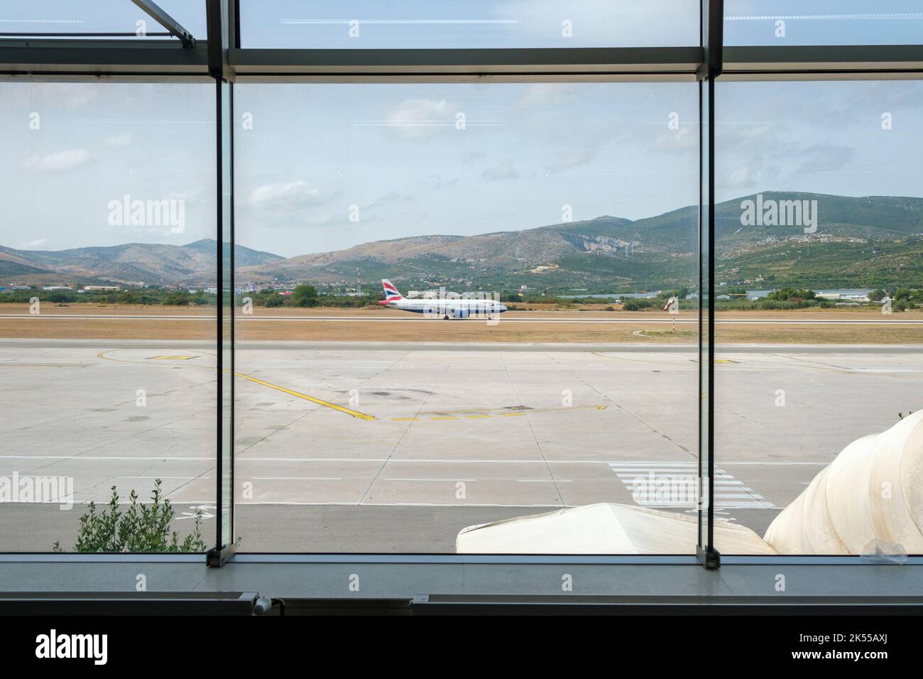 A British Airways passenger jet lands at Split airport in Croatia. Stock Photo