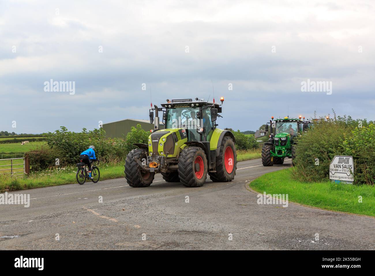 Eastriggs, Scotland - September 04, 2022: Class 650 Arion tractor followed by a John Deere tractor returning from a local charity run Stock Photo