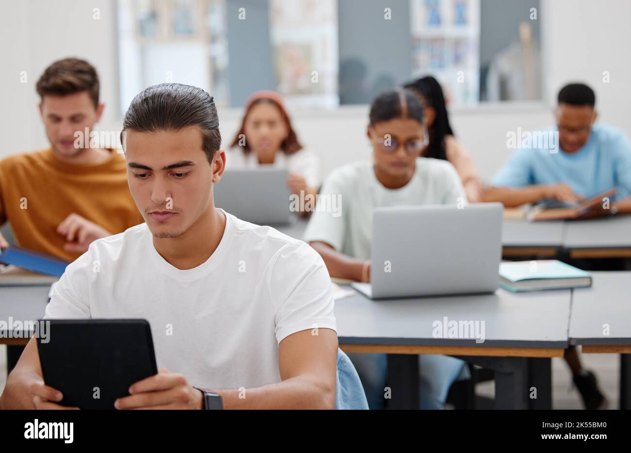 University, students and learning with laptop or tablet for digital