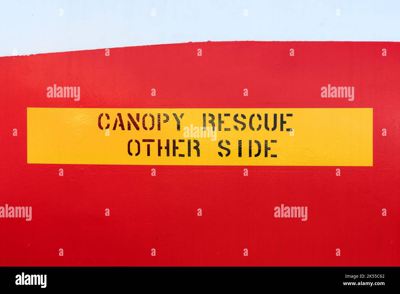 Yellow Canopy rescue other side sign with black text painted on the side of an old jet plane Stock Photo