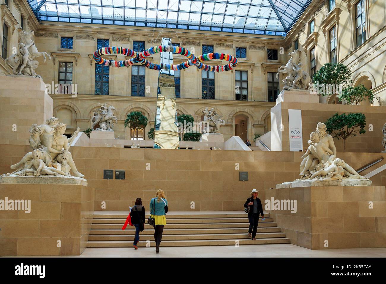 This is courtyard of the Louvre glass-covered and named in honor of ...