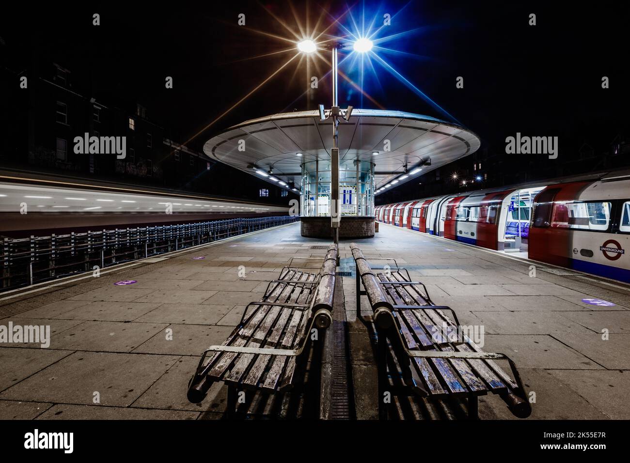 Iconic West Hampstead tube station in northwest London under the lights. Stock Photo