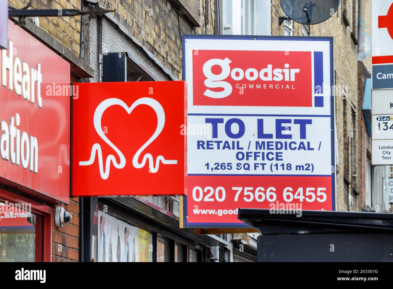 A 'To Let' sign above a closed retail property in Camden Town, London, UK Stock Photo