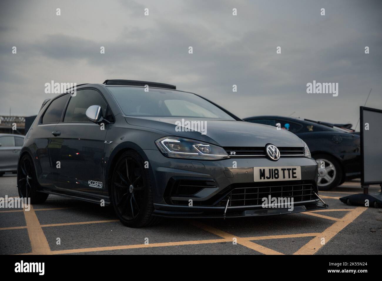 A Modified Indium Grey Metallic 2018 Volkswagen Golf R Hatchback With Gloss  Black Alloy Wheels With Aftermarket Bodykit Stock Photo - Alamy