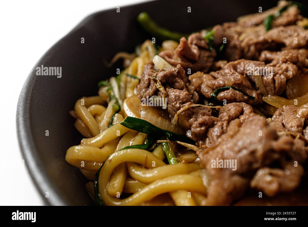 Stirfried beef brisket point mung bean sprouts on white background