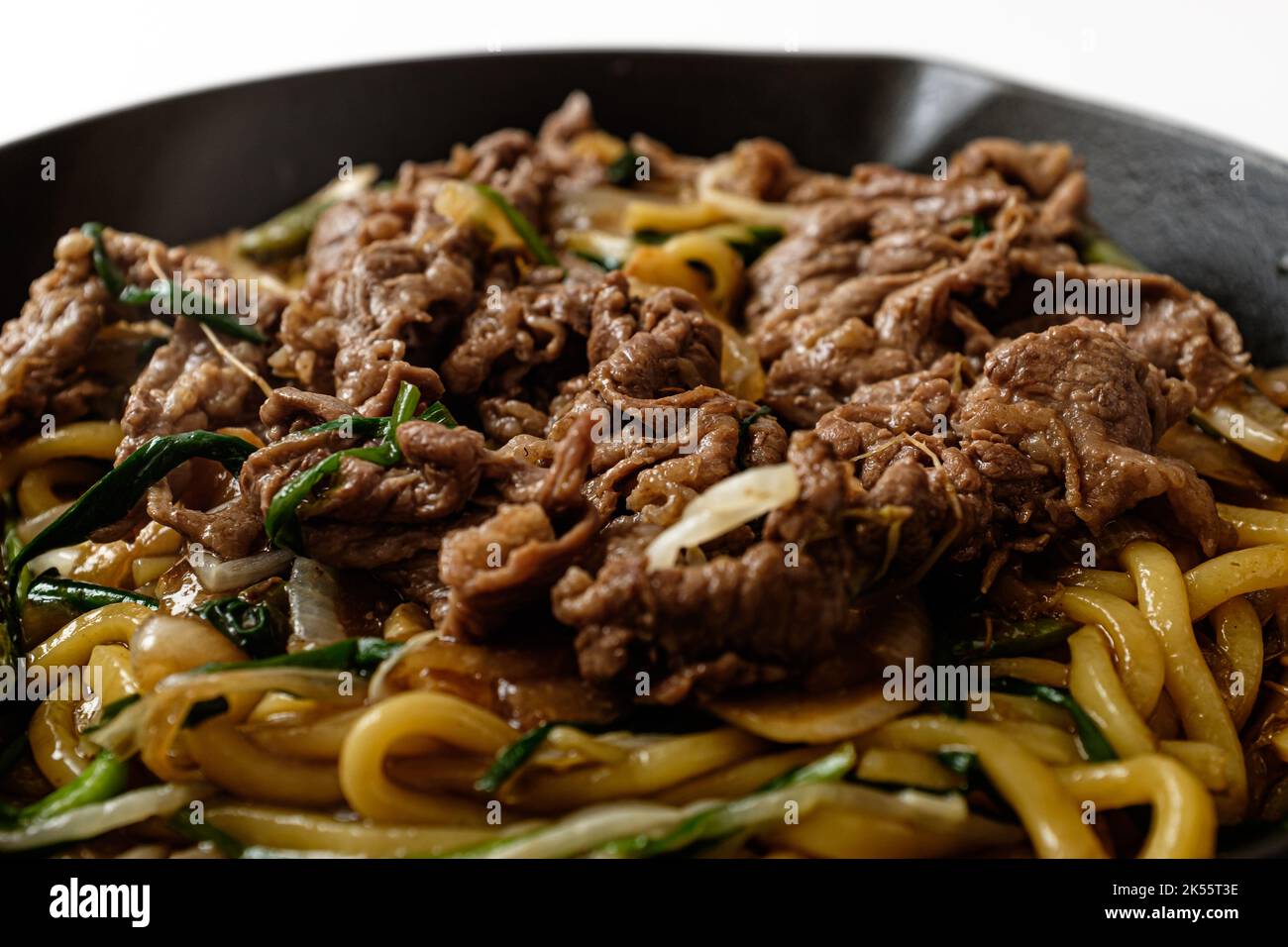 Stirfried beef brisket point mung bean sprouts on white background