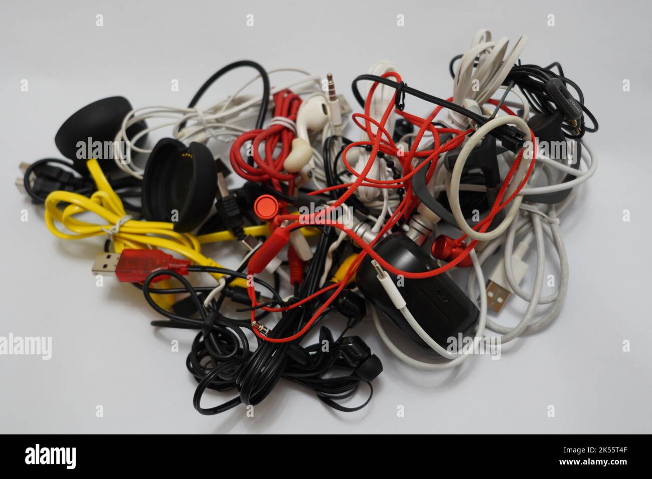 tangled cables of different types on a white background Stock Photo Alamy