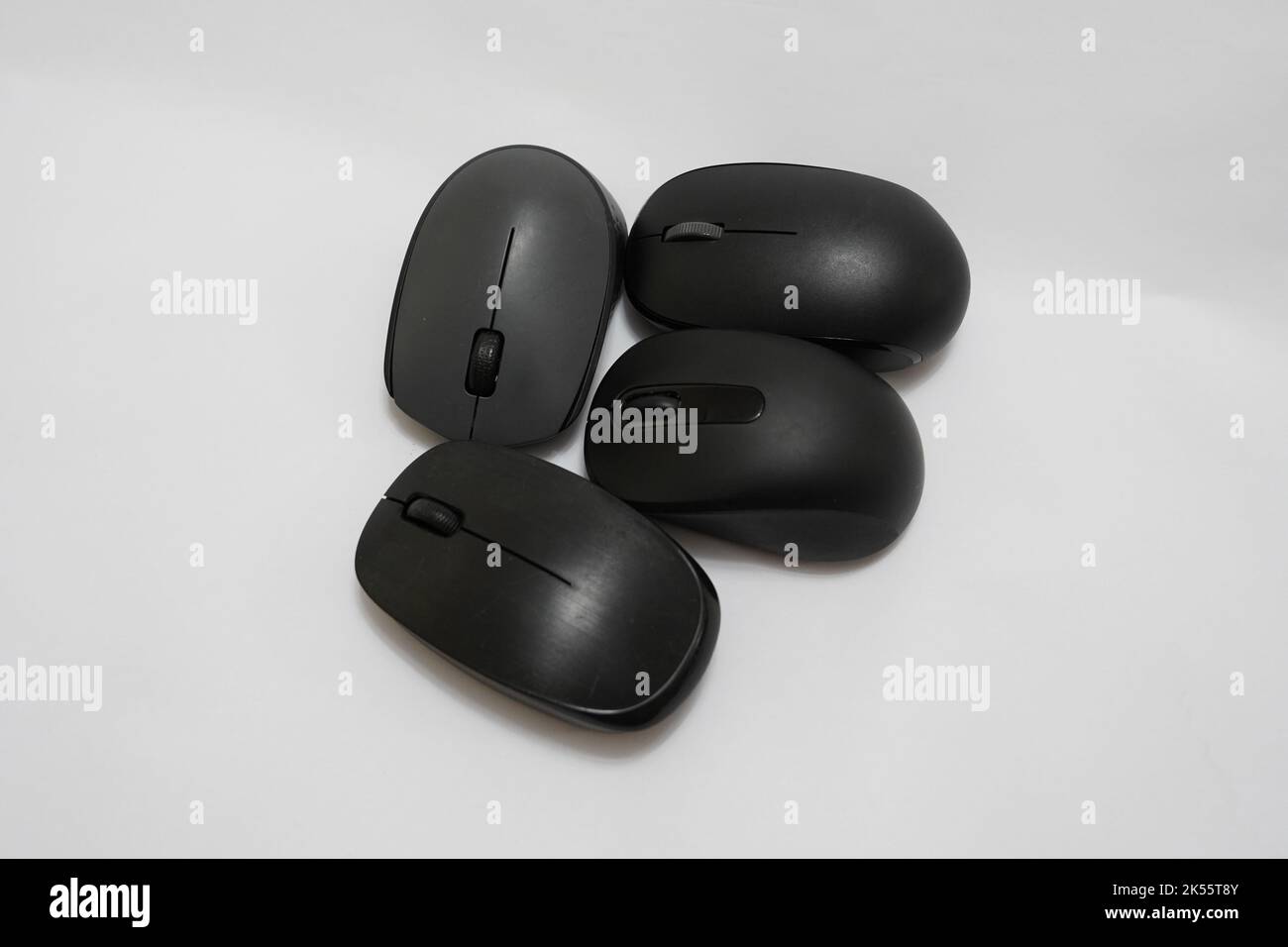 four different wireless mice on a white background Stock Photo