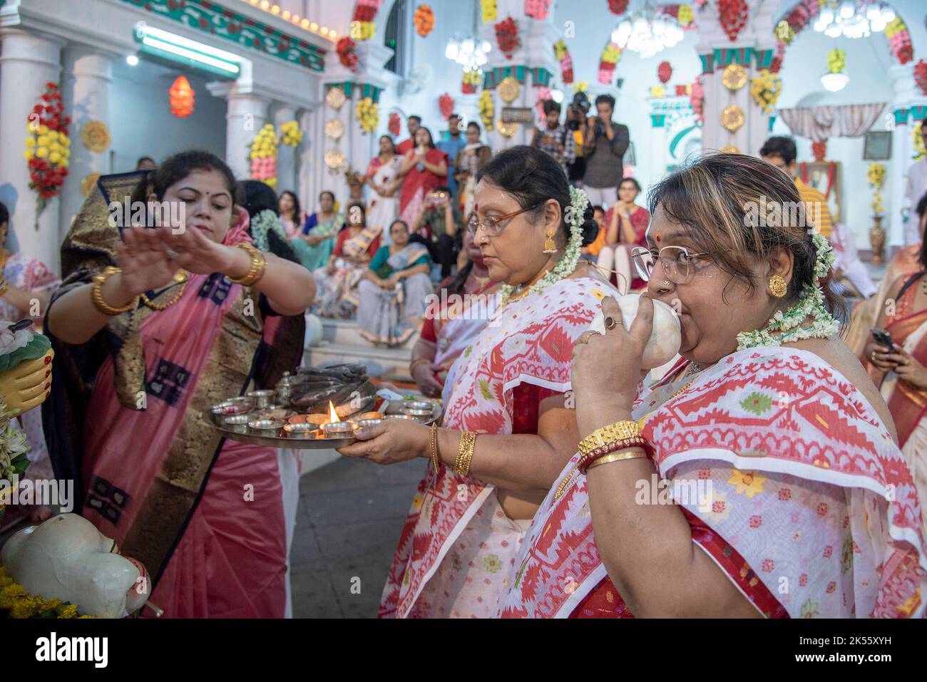 Kolkata, West Bengal, India. 5th Oct, 2022. Different moments of Farewell to Goddess Durga on the final day (Dashami -10th day) of the Durgapuja festival by women of Bonedi Bari Household (affluent family) of Kolkata/Calcutta. (Credit Image: © Amlan Biswas/Pacific Press via ZUMA Press Wire) Stock Photo