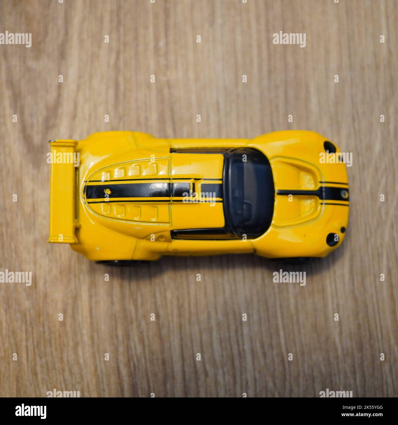 Mattel Hot Wheels yellow toy model Lotus Sport Elise race car on a