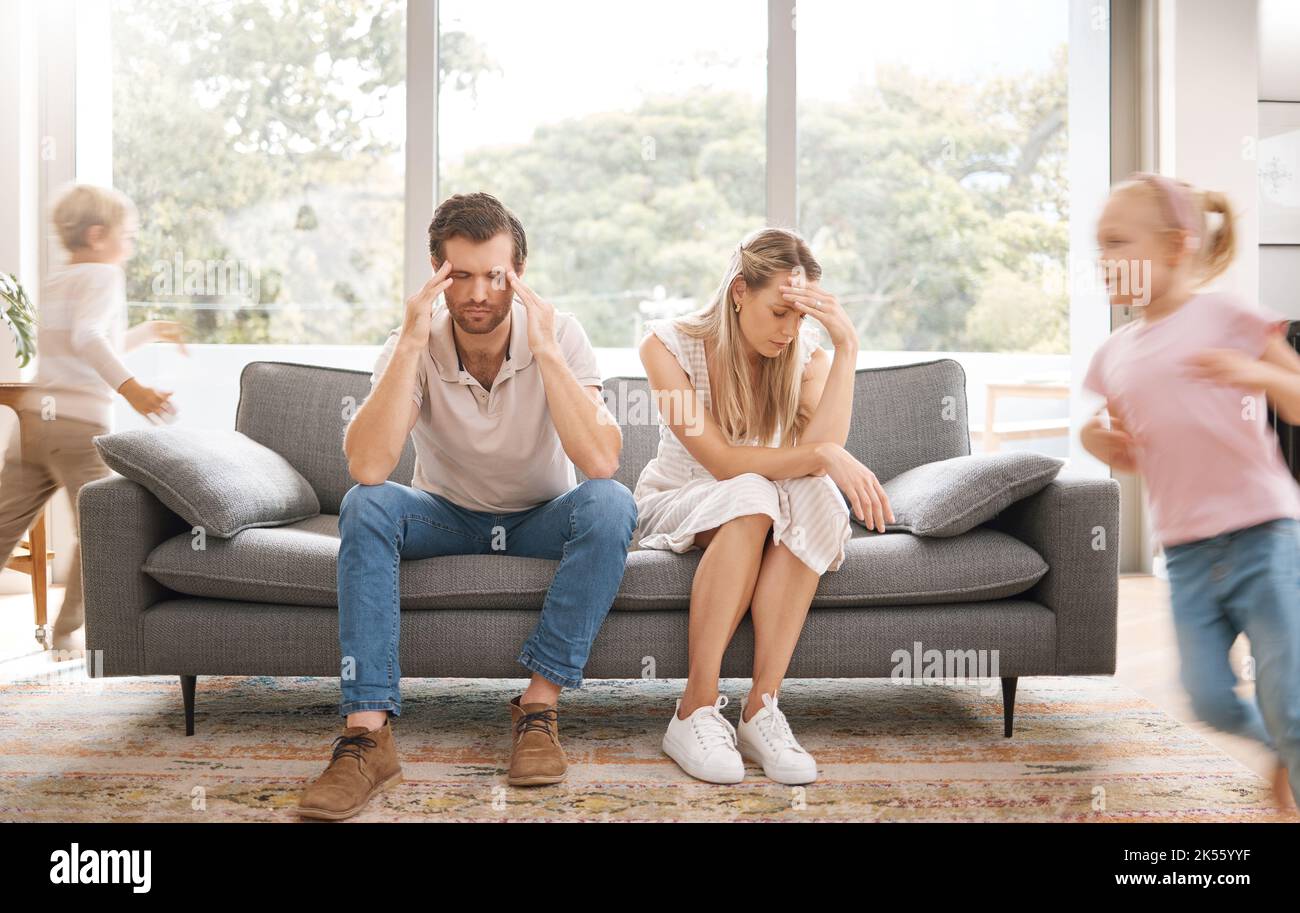 Noise, headache and stress with children and parents in a living room, overwhelmed by adhd kids energy. Burnout, anxiety and family in crisis Stock Photo