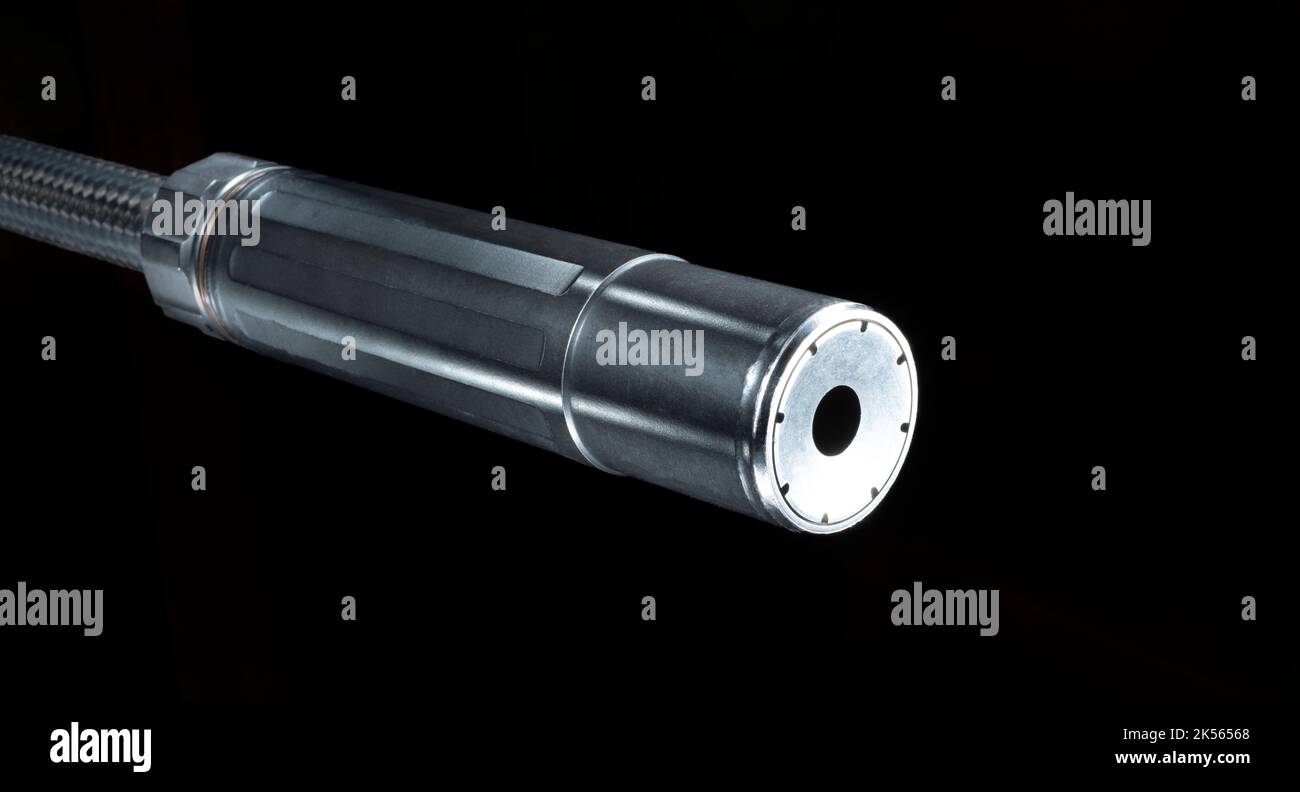 Silencer on a gun barrel with black background and copy space Stock ...