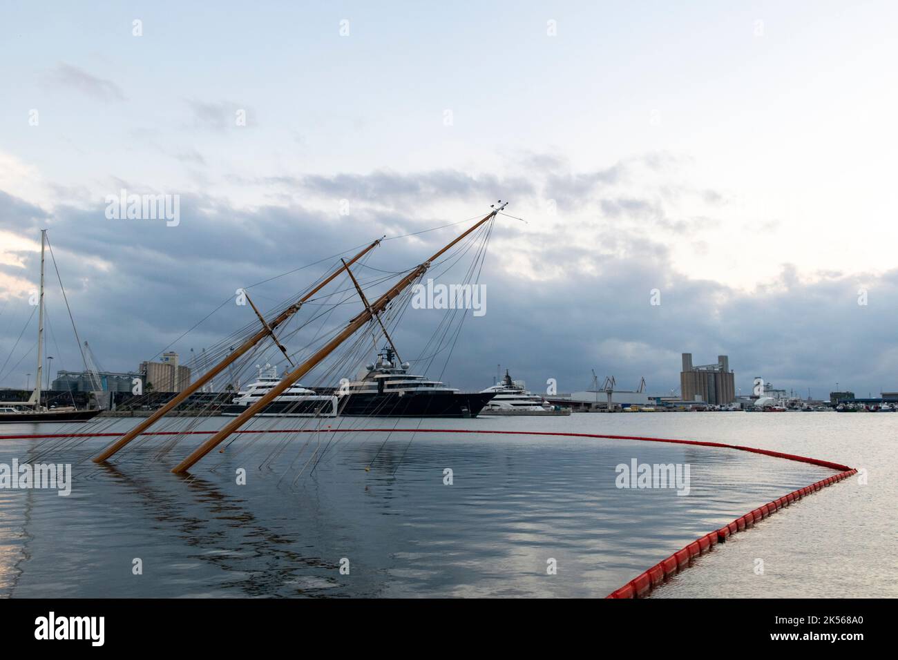 A sunken ship at the Tarragona port in July 2022. A russian luxury