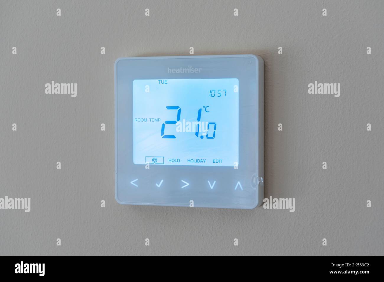Air source heat pump room thermostat Stock Photo