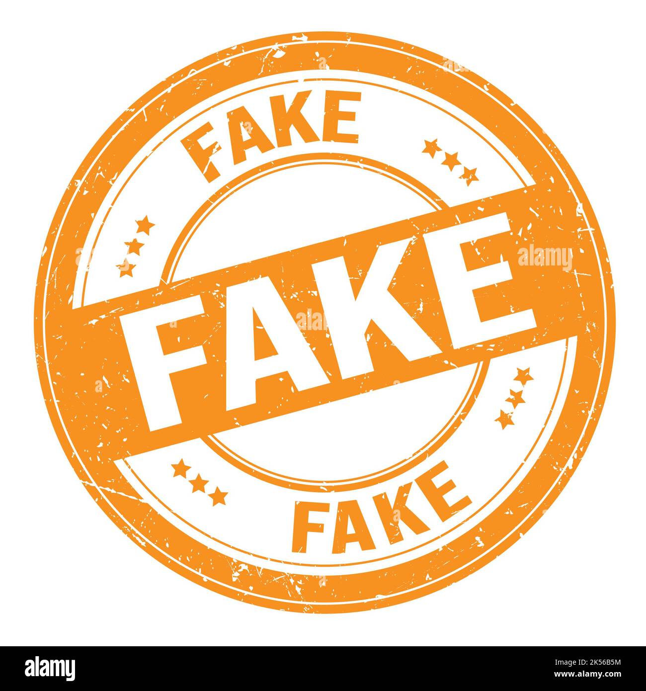 FAKE text written on orange round grungy stamp sign Stock Photo - Alamy