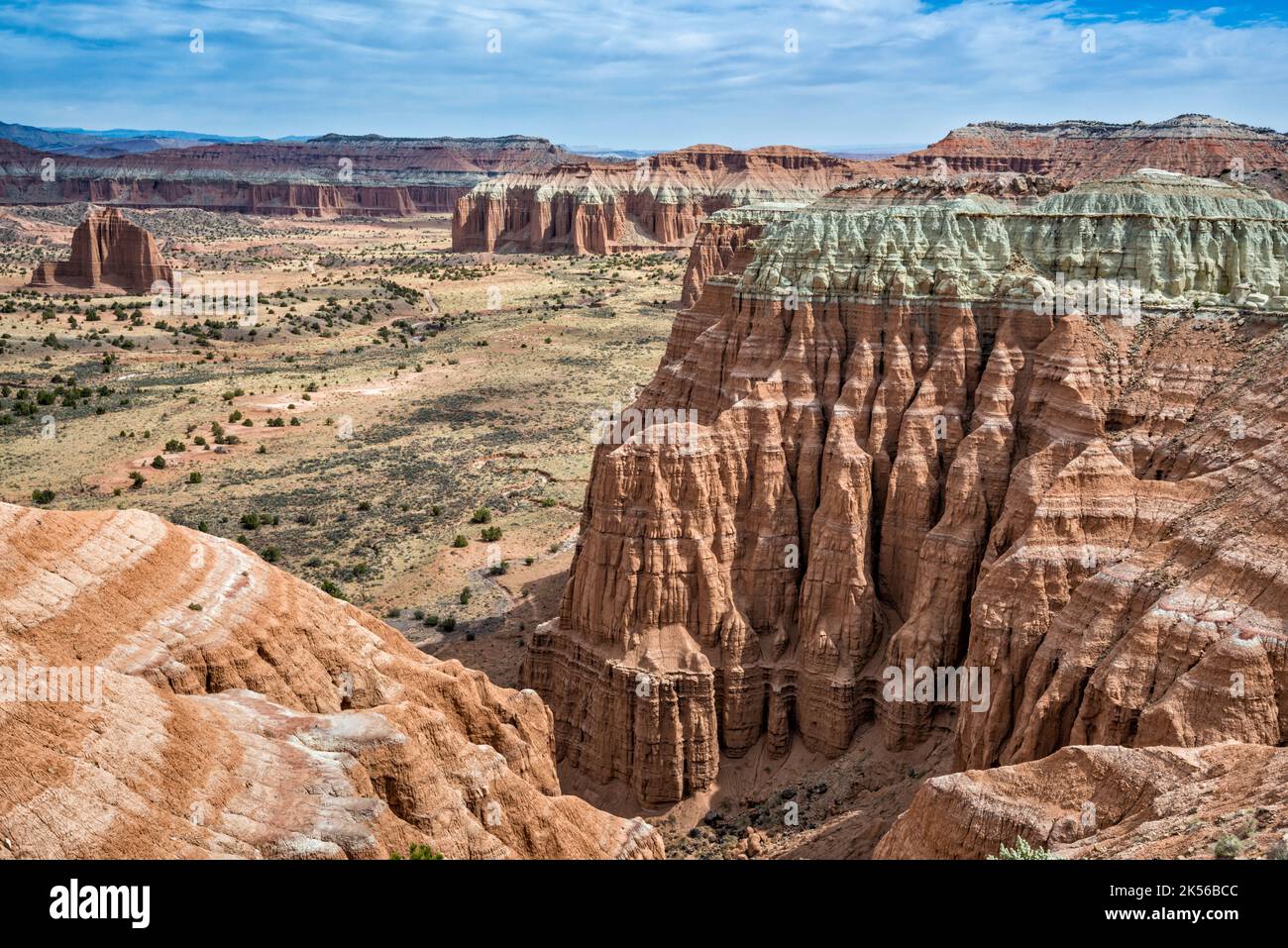 Entrada Sandstone and Curtiss Sandstone fluted cliffs, Upper Cathedral Valley, view from The Hartnet mesa, Capitol Reef National Park, Utah, USA Stock Photo