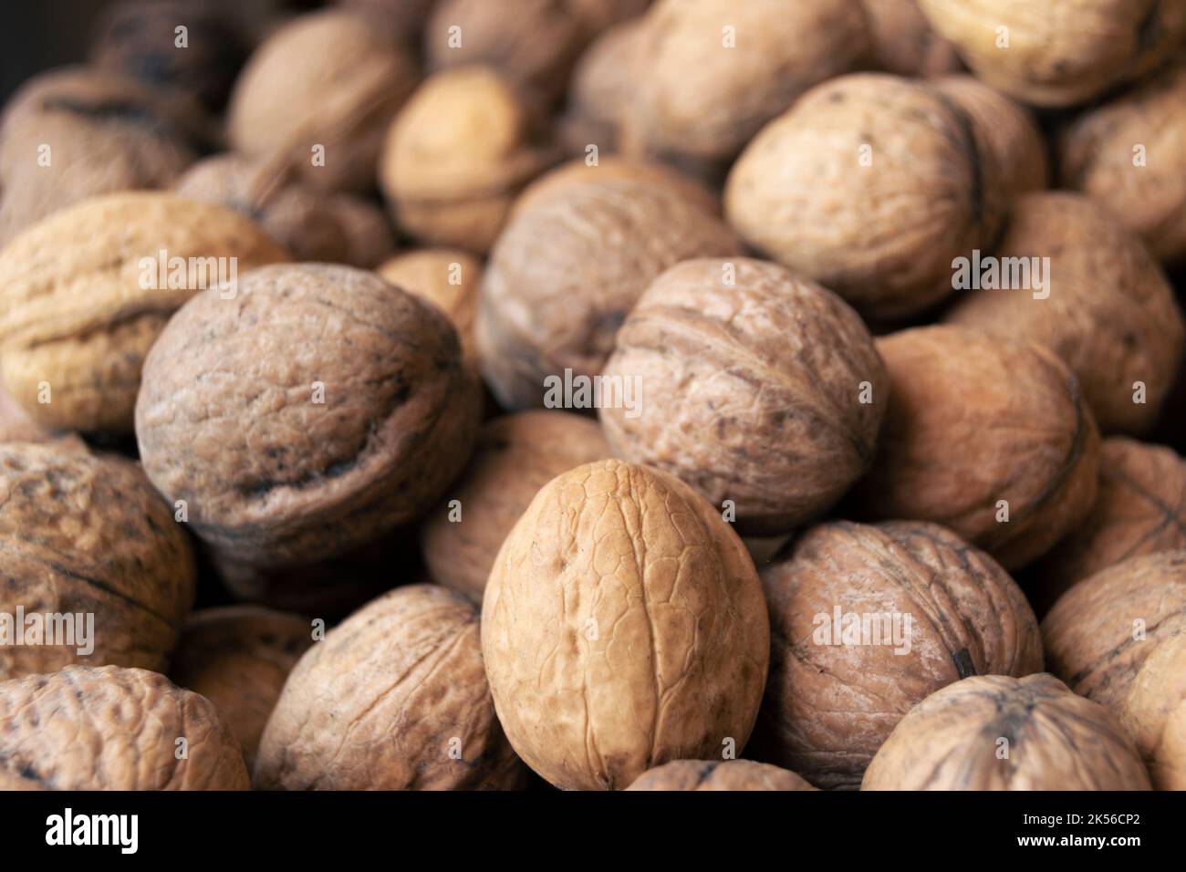Pile of raw walnuts closeup as background Stock Photo Alamy