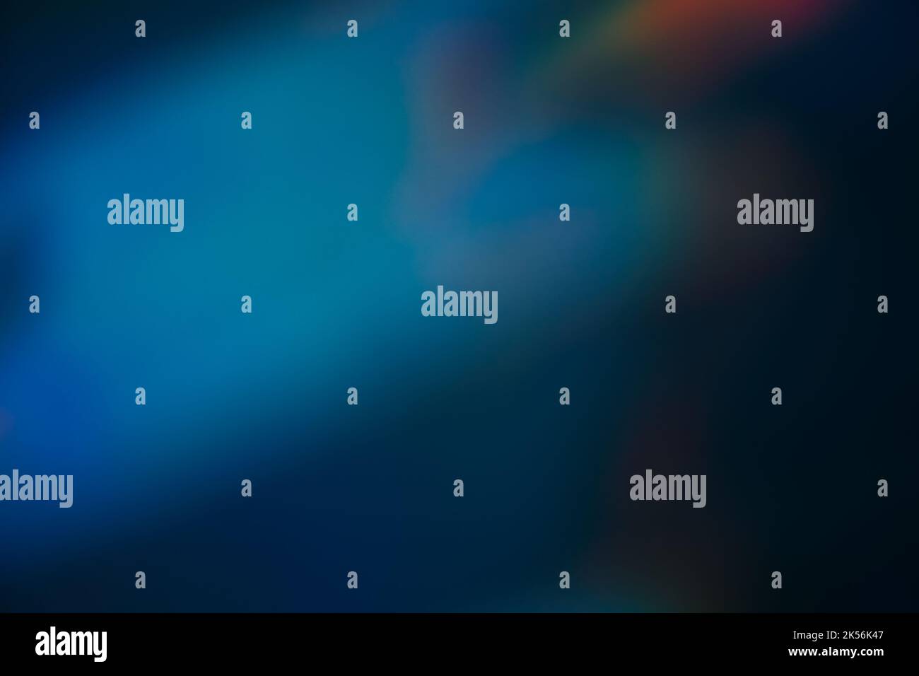 blur light leak lens flare blue red glow on dark Stock Photo - Alamy