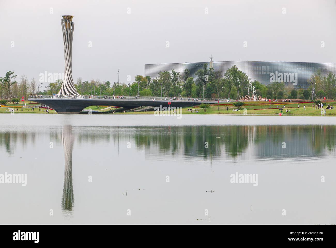 Chengdu, China - 4th October 2022: The torch tower of the postponed Chengdu 2021 University Games reflected in the waters at Dong’an Lake Sports Park, Stock Photo