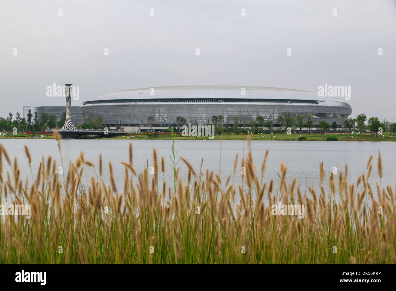 Chengdu, China - 4th October 2022: View of Dong’an Stadium from Dong’an Lake, one of the main venues of the Chengdu 2021 World University Games Stock Photo