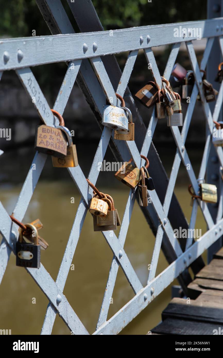 Love padlocks on Elizabeta Bridge railing on Somes River on August 21, 2018 in  Cluj-Napoca. Stock Photo
