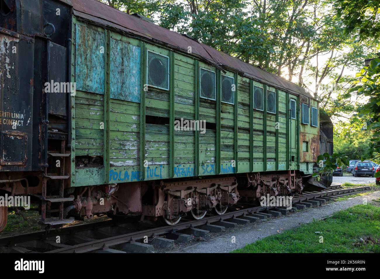 Old freight car parked in a depot in Craiova, Romania Stock Photo
